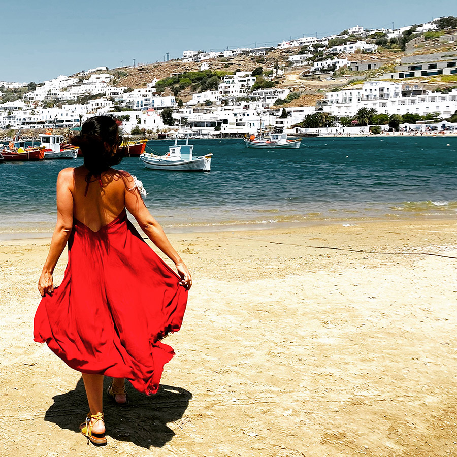 lady in red photo taken in Mykonos Greece